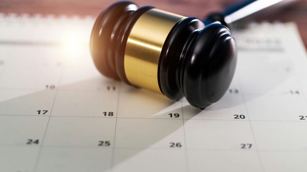 Calendar and legal documents illustrating Ontario's 60-day notice rule for snow and ice slip and fall claims