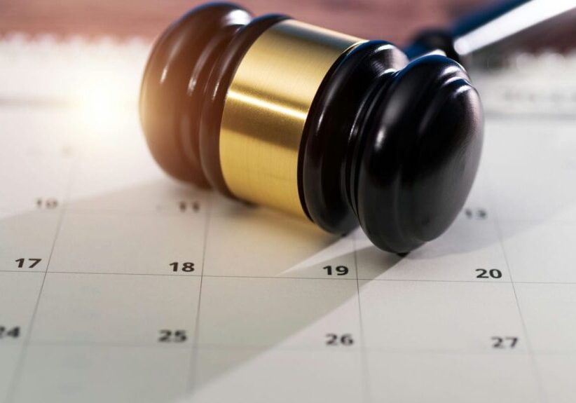 Calendar and legal documents illustrating Ontario's 60-day notice rule for snow and ice slip and fall claims
